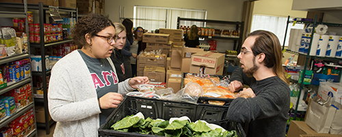 Students volunteer at the local food pantry.